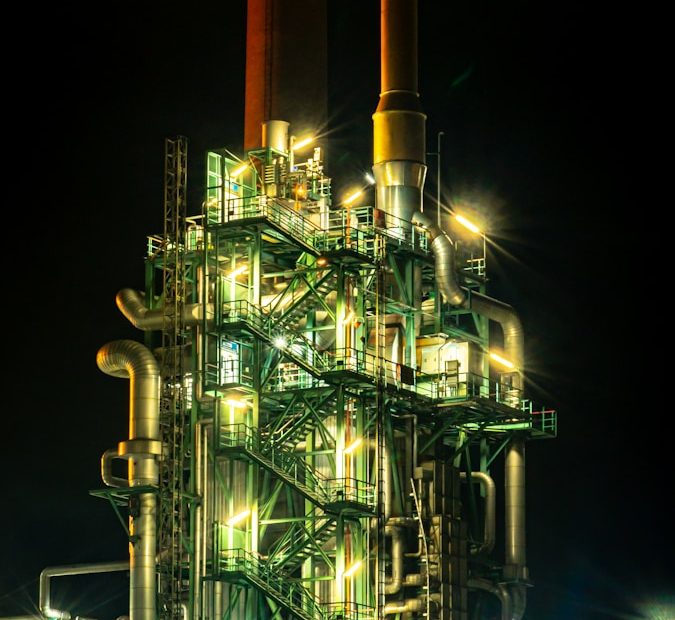 brown and black factory during night time